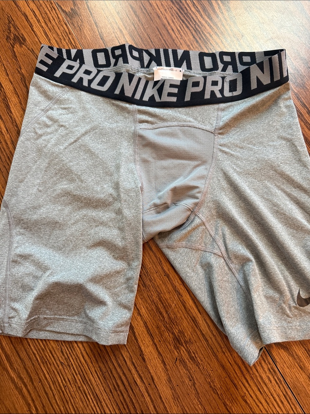 Nike Pro Men's Light Gray Athletic Compression Shorts with Black Waistband